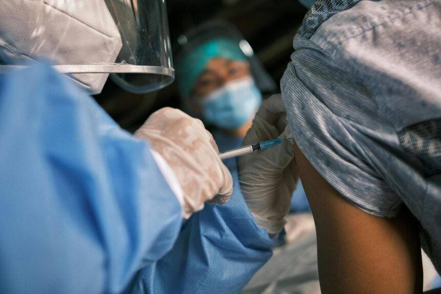 Health workers in protective equipment responding to Ebola outbreak in East Africa