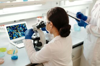 Clinical laboratory showing advanced cell and gene therapy preparation in a controlled environment