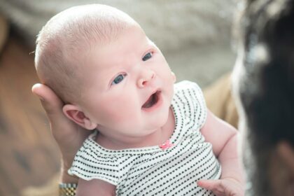Parent speaking to baby using parentese communication style