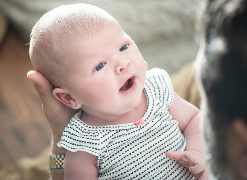 Parent speaking to baby using parentese communication style