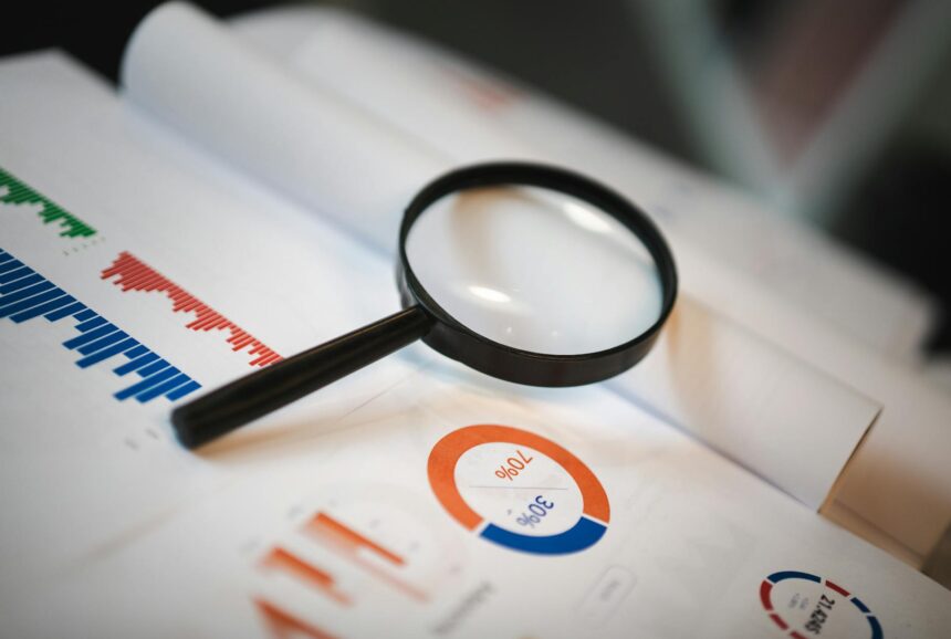 Medical researchers reviewing data charts showing registration requirements across different study types