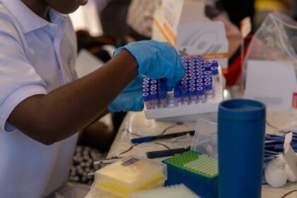 Global health crisis: Ebola laboratory testing and vaccine development urgency