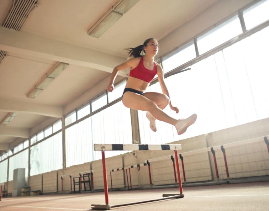 Athlete demonstrating explosive movement with biomechanical force analysis overlay