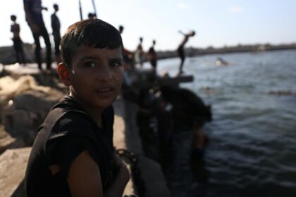 Children receiving medical care in Gaza humanitarian crisis