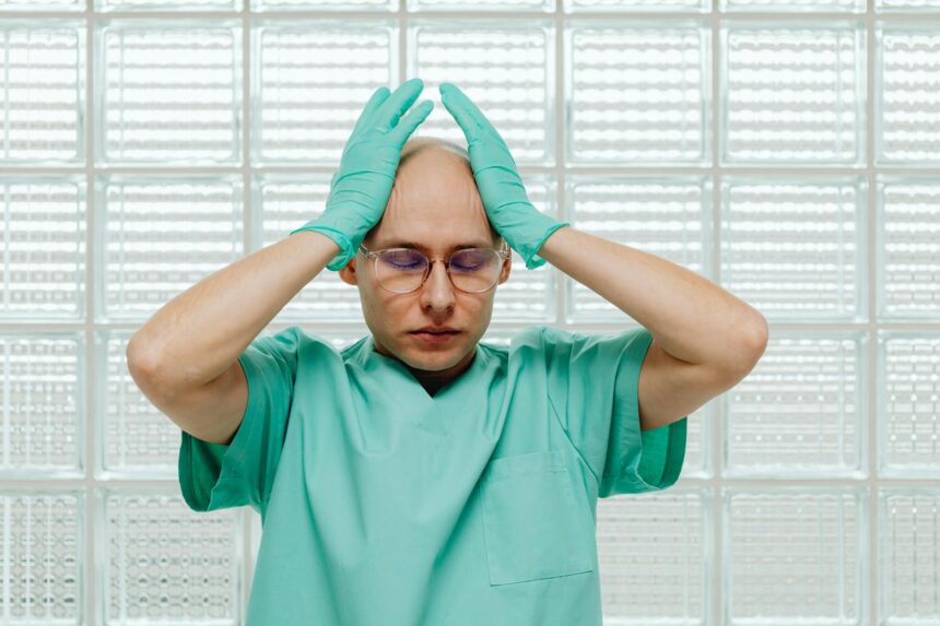 Healthcare professionals discussing patient care in hospital setting showing human connection