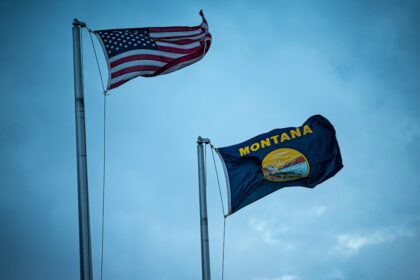 Montana state capitol building with healthcare policy documents