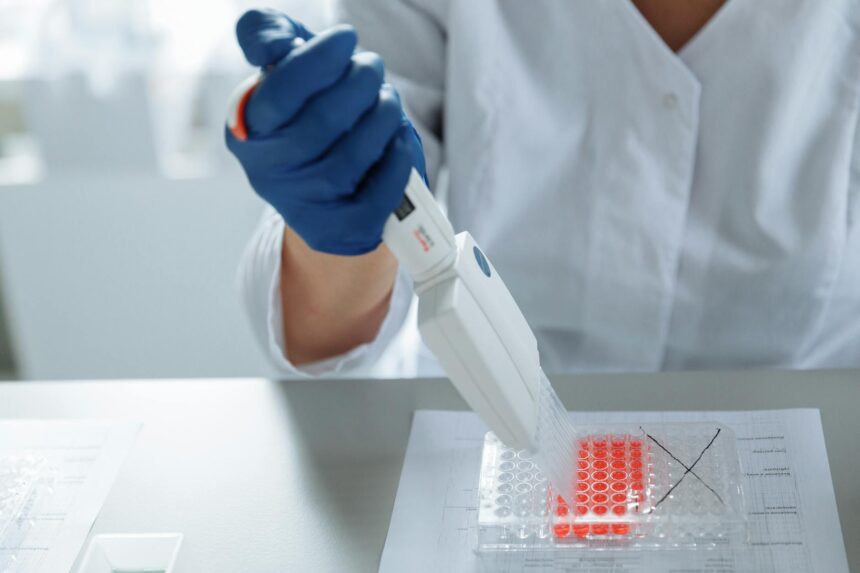 Medical illustration showing stem cell-derived heart patch being placed on damaged cardiac tissue