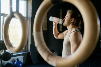 Scientific diagram showing creatine supplementation timing and performance benefits