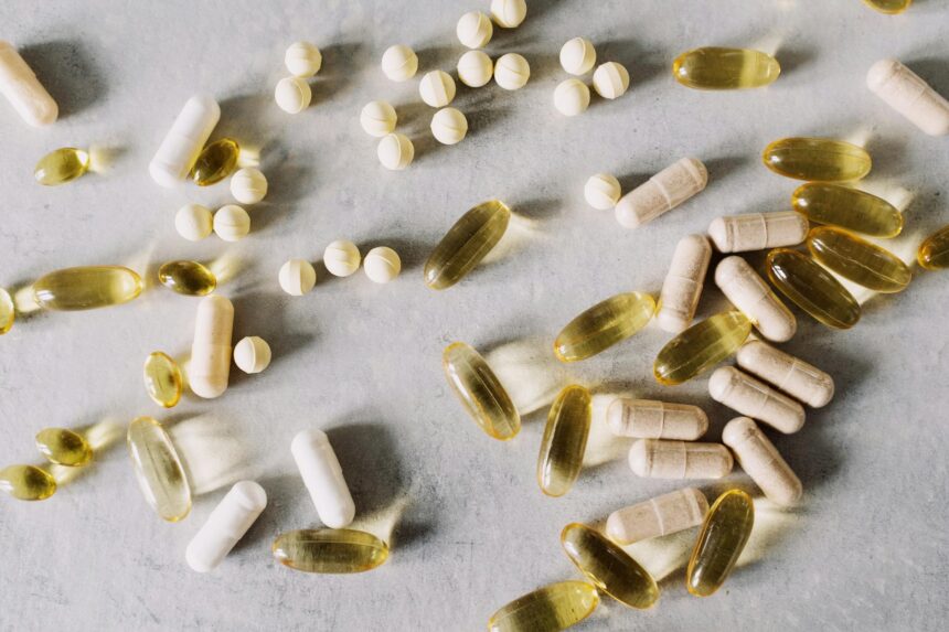 Vitamin D supplement capsules with molecular structure diagram showing D2 and D3 differences