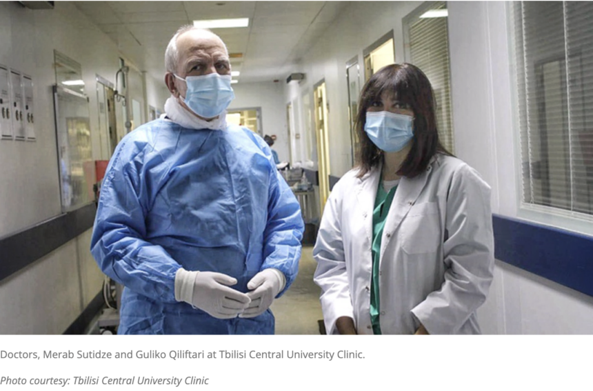 Healthcare professionals working in a hospital corridor in Tbilisi, illustrating the importance of protecting and supporting the health workforce.