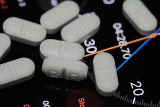 Hospital pharmacy with AI monitoring system interface showing drug dispensing data