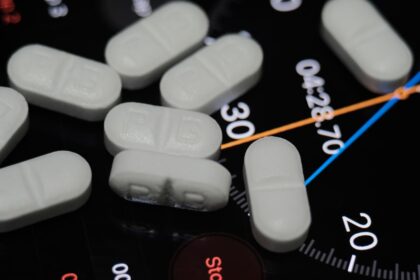 Hospital pharmacy with AI monitoring system interface showing drug dispensing data
