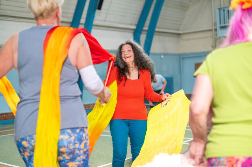 Healthcare professional engaging in arts activity as part of social prescribing program