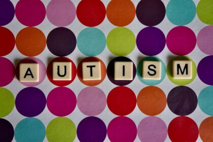 Medical professionals reviewing clinical guidelines for autism and schizophrenia comorbidity