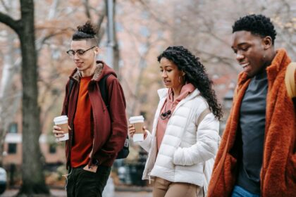 Group of people walking together outdoors for mental health support