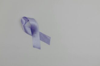 Medical illustration of pancreatic cancer treatment research and targeted therapy development