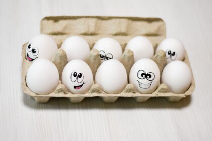 Medical illustration of egg nutrients and brain health: choline, lutein, DHA; Alzheimer's protection concept