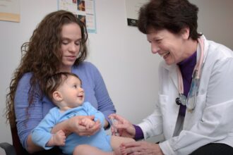 Medical laboratory testing for measles virus confirmation showing positive results