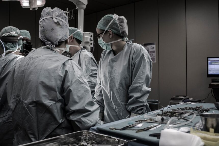 Healthcare professional in clinical setting processing distant conflict trauma