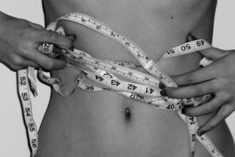 Comprehensive obesity management framework showing medication as one component alongside behavioral, nutritional, and psychological interventions