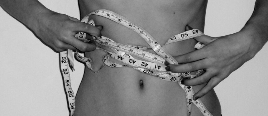 Comprehensive obesity management framework showing medication as one component alongside behavioral, nutritional, and psychological interventions