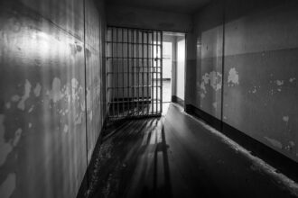 Medical stethoscope over legal documents representing healthcare lawsuits in immigration detention