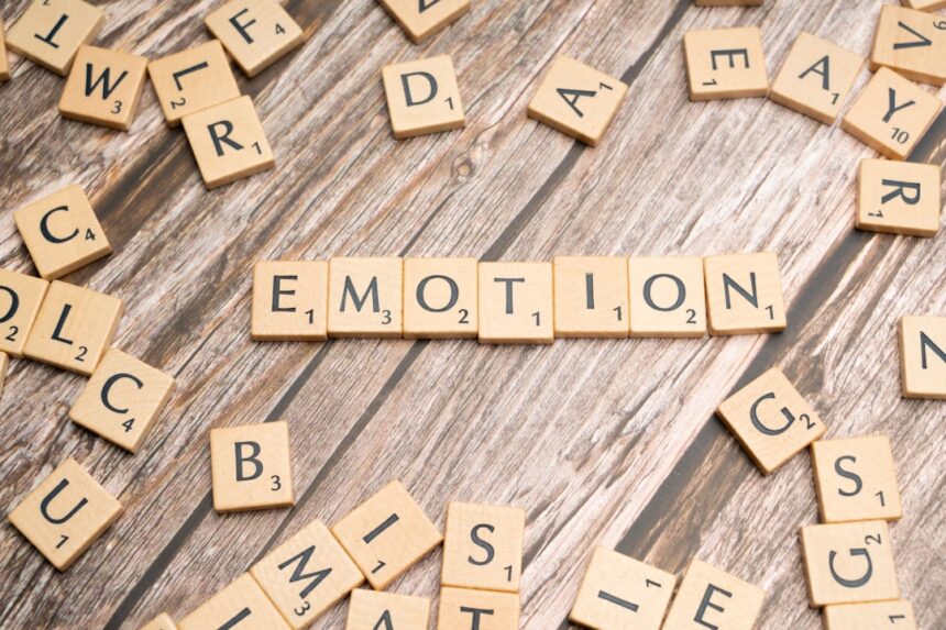 Person practicing mindfulness meditation for emotional regulation in peaceful setting