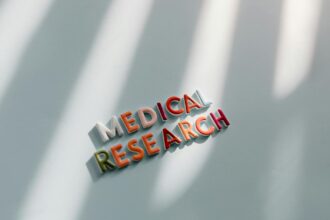 Researcher analyzing mental health therapy evaluation methods and research standards