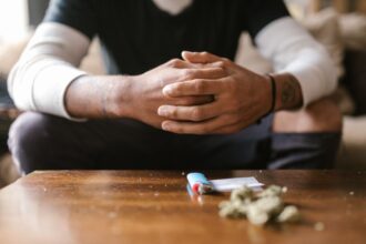 Smartphone displaying health intervention text messages for cannabis use reduction