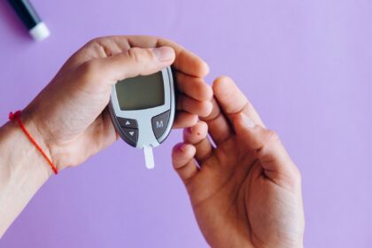 Illustration of continuous glucose monitor showing varying glucose responses in different individuals