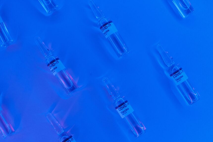 Scientific research laboratory with charts showing reproducibility statistics and reform initiatives