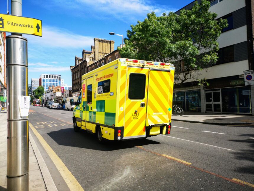 NHS emergency department during busy period with medical staff treating patients