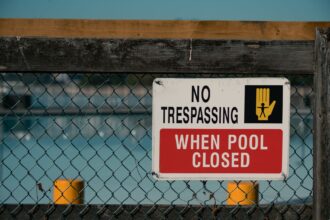Public swimming pool closure sign reflecting Canada health infrastructure crisis