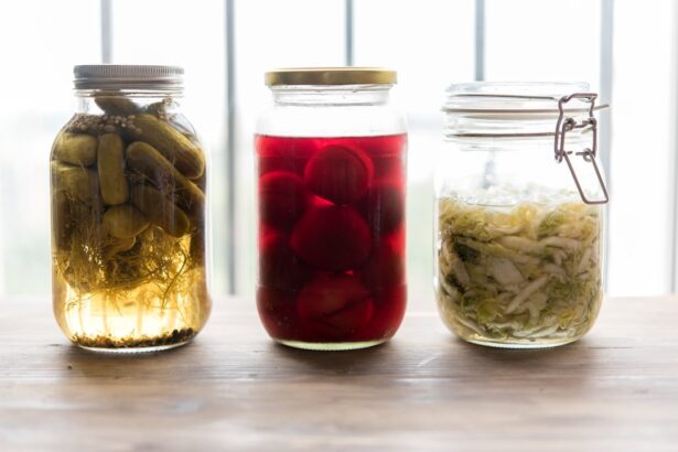Variety of fermented foods including kimchi, sauerkraut, yogurt, and miso representing gut health and microbiome diversity