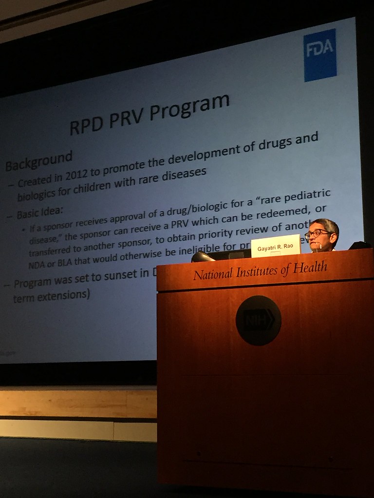 Laboratory researcher examining genetic samples for ultra-rare disease research
