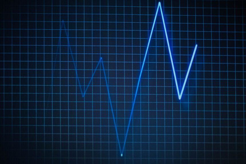 Illustration of cardiac cells synchronizing to produce first heartbeat through collective electrical activity