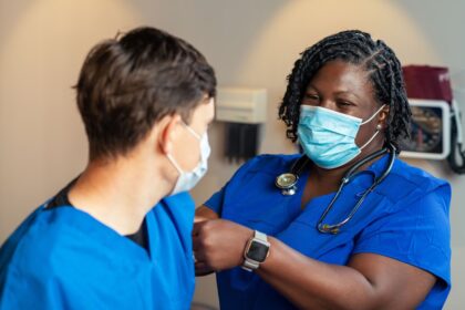Healthcare worker administering influenza vaccine during peak season preparedness campaign