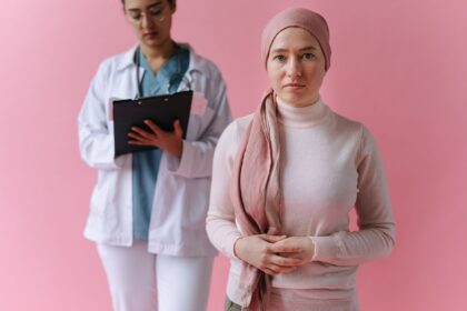 Adult woman in thoughtful pose, representing late-diagnosed autistic women documenting their experiences