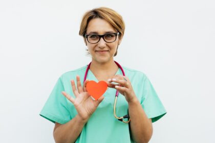 Illustration of interprofessional heart failure care team: cardiologist, nurse practitioner, pharmacist, and heart failure patient