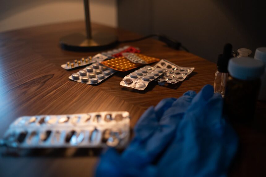 Healthcare patient receiving care in hospital after medication access delay
