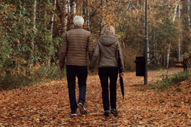 Older adult walking outdoors in park, demonstrating daily physical activity for brain health