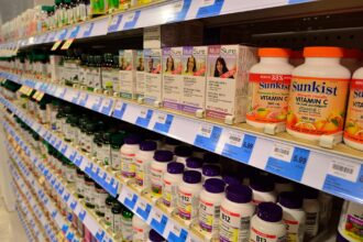 Shelves of dietary supplements in a pharmacy