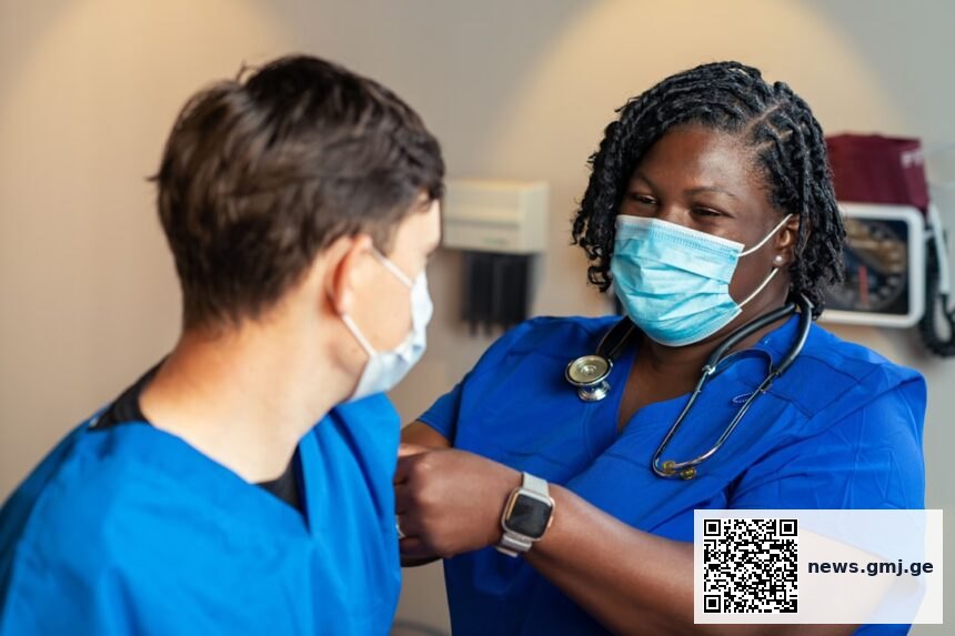 Healthcare worker administering influenza vaccine during peak season preparedness campaign