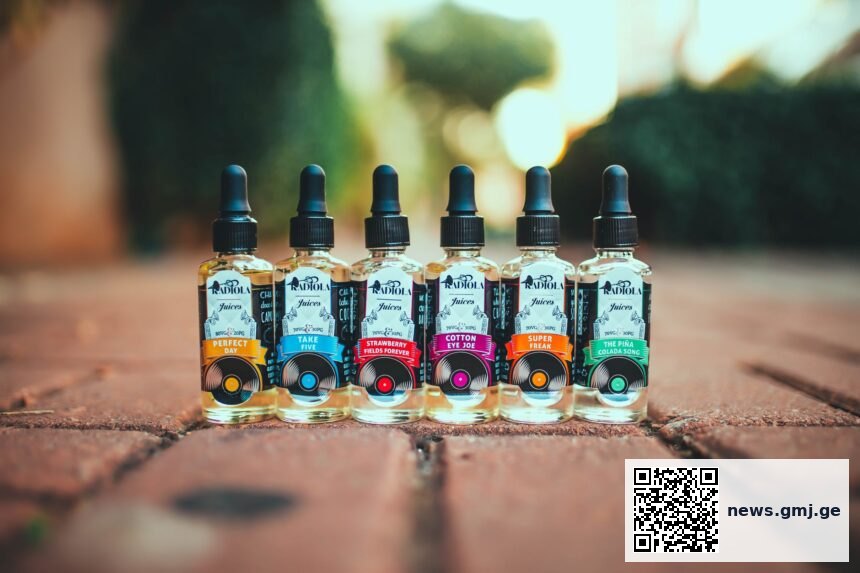 Electronic cigarette vape products with labels and packaging on display