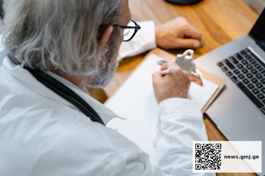 Healthcare professional reviewing AI clinical decision support tool with patient data